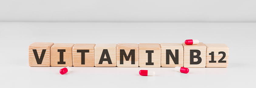 Schriftzug Vitamin B12, mit Holzbausteinen gesetzt