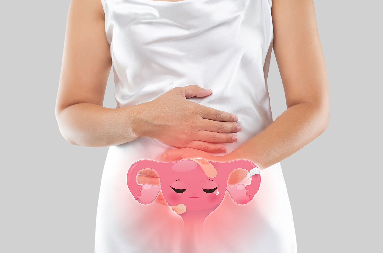 rosa farbige Illustration einer Gebärmutter auf dem Unterleib eines Mädchens 
