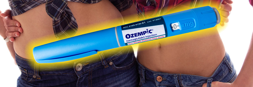 Zwei schlanke Damenbäuche, davor eine Oezmpicspritze