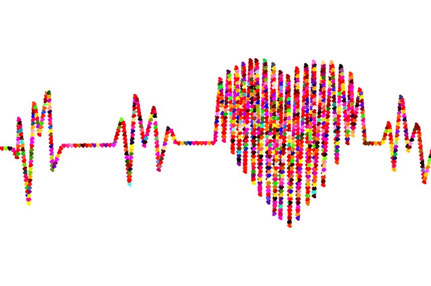 Darstellung Elektrokardiogramm mit bunten, kleinen Herzchen