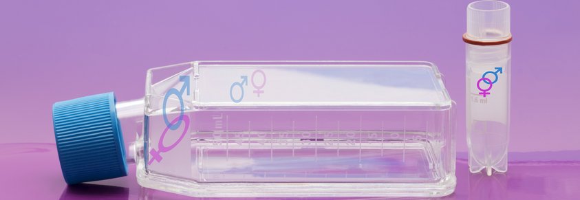 Gender medicine research concept: Gender symbols on tissue culture flask and screw cap tube